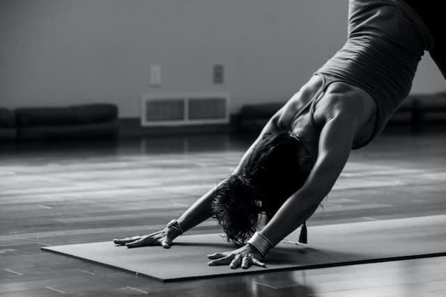 woman in yoga position